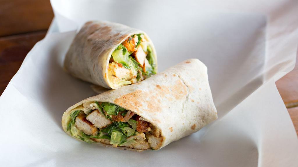 Chicken Caesar Wrap · Wrap with chicken, lettuce, tomatoes, Caesar dressing and your choice of bread.