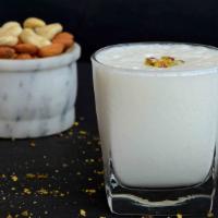 Lassi · Blended yogurt drink with your choice of flavor.