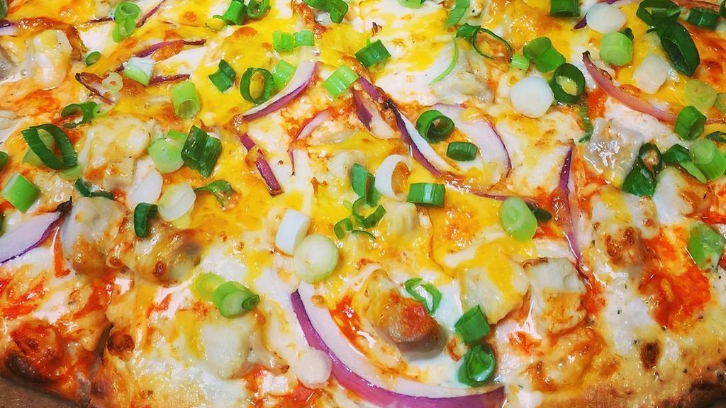 Buffalo Chicken Pizza · White sauce, original crust, mozzarella cheese, chicken, red onions, green onions, cheddar & frank’s spicy buffalo sauce.