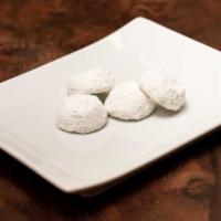 Wedding Cookies · Delicate shortbread cookies with fresh ground pecans and lemon zest. All-purpose unbleached ...