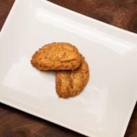 Almondine · A crunchy, buttery shortbread almond cookie that is reminiscent of biscotti. Ingredients: al...