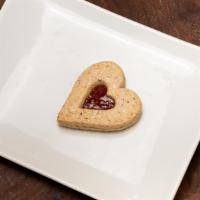 Gluten-Free Raspberry Linzer · Slightly tart raspberry jam sandwiched between tender butter cookies. Ingredients: gluten-fr...