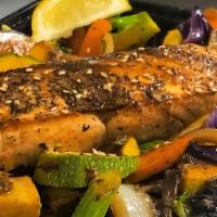 Salmon Plate · Grilled salmon served with vegetables and rice.