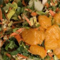 Chinese Chicken Salad · Romaine lettuce, green pepper, shredded carrots, chopped green onions, crispy noodles, slive...