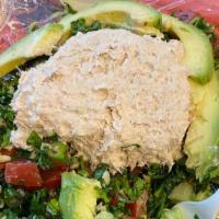 Avocado Stuffed With Tuna Salad · Lettuce, shredded carrots, tomatoes, cucumbers, and choice of dressing. Served with choice o...
