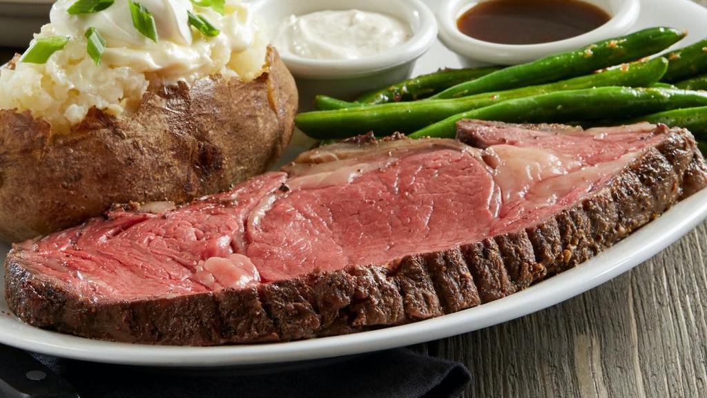 Prime Rib Entree* Limited Availability · 15 oz. of super tender prime rib, slow-roasted for over 4 hours and served with au jus and creamy horseradish. Complete with your choice of two classic sides.  AVAILABLE FRIDAY-SATURDAY AFTER 4PM AND ALL DAY SUNDAY.