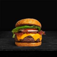 Guac To Guac Bacon Burger · Beef patty topped with  avocado, bacon, melted cheddar cheese, lettuce, tomato, onion, mayo,...