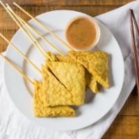 Tofu Satay (6) · Gluten-free. Tofu prepared satay style on skewers and served with our peanut sauce and cucum...