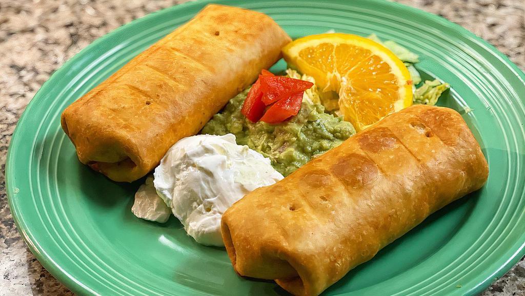 Chingalingas · Crispy burritos stuffed with choice of meat and cheese. Served with guacamole and sour cream.