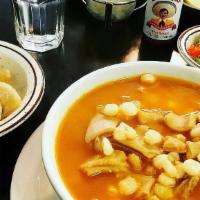 Menudo · Bite-sized pieces of tripe simmered slowly in a blend of delicious herbs, and hominy. Served...