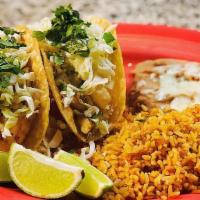 Tasty Taco Meal  · Choice of soft corn or flour tortillas. Topped with cabbage, cilantro, and cheese. Pico de g...