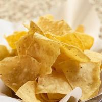 Chips · Crispy corn tortilla chips made daily.