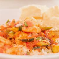 Grilled Shrimp Rice Bowl · grilled shrimp, fajita veggies, rice served with pico de gallo and tortilla chips.