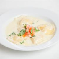 Lobster Ravioli · Lobster filled with ricotta cheese, basil, white wine cream sauce touch of tomato concasse.