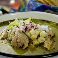 Pozole Verde De Pollo · A green hominy stew (pozole), with shredded chicken breast, served on the side cabbage, radi...
