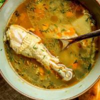 Caldo De Pollo · A chicken soup, mixed veggies, side of rice and three handmade tortillas.