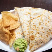 Quesadilla · Flour tortilla, with a melted shredded cheese and choice of protein. Side of tortilla chips ...