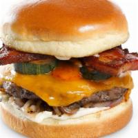 Deluxe Bacon Burger · Chuck angus prime burger topped with thick cut bacon, cheddar cheese, secret sauce, garlic a...
