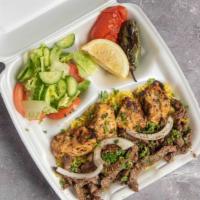 Chicken Kabob & Beef Shawarma · Served with rice salad grilled tomato pita bread and hot sauce.