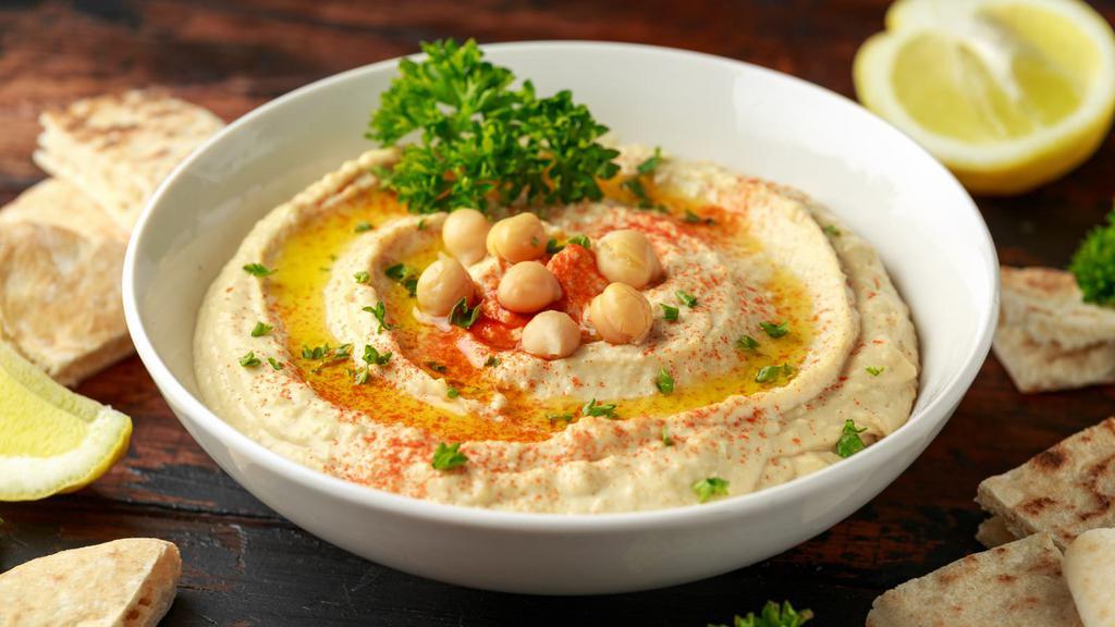 Hummus · Classic Middle Eastern spread made of blended chickpeas and other seasoning. Goes great with pita bread or falafel!