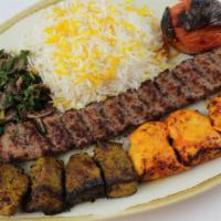 Combination Plate · 2 Beef kabob and 1 chicken tikka served with mixed vegetables, grilled tomato, tahini sauce ...