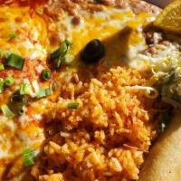 Cheese Enchiladas · 3 cheese enchiladas on red corn tortillas with gravy, topped with cheese.