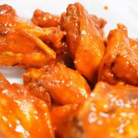 Bulldog Wings · Bone in jumbo wings, fresh never frozen, and tossed in the sauce of your choice...or keep th...