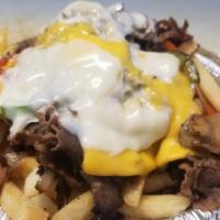 Philly Cheese · Philly steak, grilled peppers, mushrooms and onions provolone and American cheese a top a be...