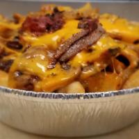 Pastrami · High grade pastrami piled high, grilled onions, mushrooms, American cheese a top a bed of fr...