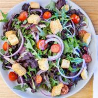 House Salad · Spring mix, tomatoes, onions, olives and house dressing.