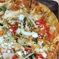 Thick-Style Flatbread (Baja Chicken) · Pepper jack & cotija cheeses, fire roasted red peppers, onion & cilantro, poblano sauce & sc...