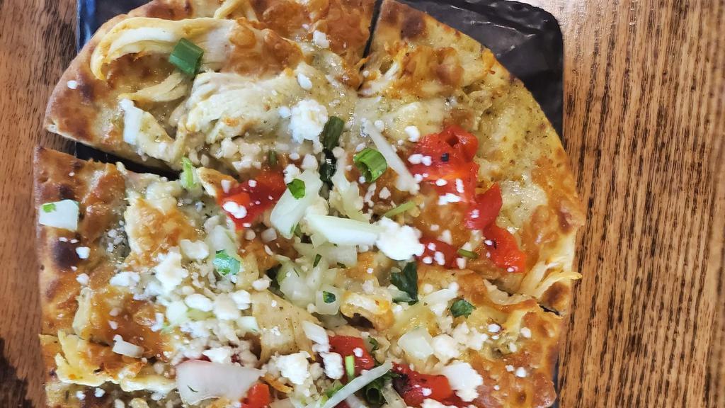 Thick-Style Flatbread (Baja Chicken) · Pepper jack & cotija cheeses, fire roasted red peppers, onion & cilantro, poblano sauce & scallions (1030 cal