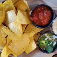 Chips And  Dips Trio · Salsa, house-made guacamole & white queso (630 CAL.)