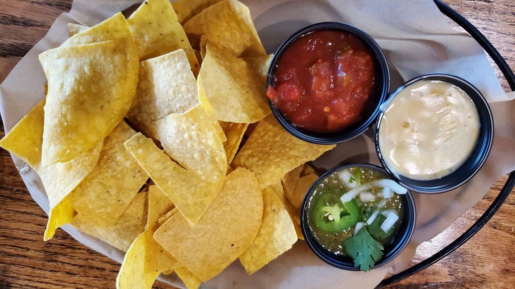 Chips And  Dips Trio · Salsa, house-made guacamole & white queso (630 CAL.)