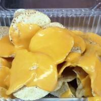 Nachos · Corn Chips topped with that gooey nacho cheese