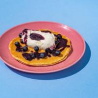 Ricotta Pancake · House-made pancake, lemon ricotta cream, blueberry sauce, fresh blueberries