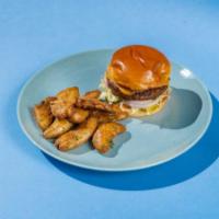 Beyond  Burger · Toasted brioche bun, Beyond beef, lettuce, pickles, caramelized onion, vegan cheese, vegan m...