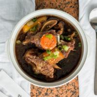 Galbi Jjim · Braised beef short ribs: beef short ribs, trimmed of fat, seasoned in sweet soy sauce and br...