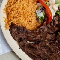 Asada Platter · Thin slice of asada with your choice of corn or flour tortillas. Served with rice, beans and...