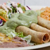 3 Taquitos Platter · Made with corn tortillas served with guacamole. Served with rice, beans and a small salad.