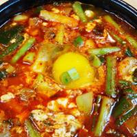 Seafood Tofu Soup · Korean Spicy Tofu Soup with Clams, Mussels, Shrimp, and Calamari.