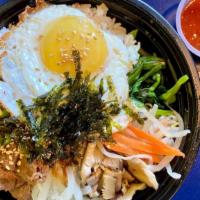Bibimbap · Korean Traditional Rice Bowl. Comes with Sliced Radish, Steamed Shiitake Mushroom, Korean Sp...