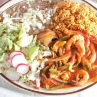 Camarones Rancheros · Shrimp cooked with ranchero sauce, bell peppers, onions, tomatoes and served with rice, bean...