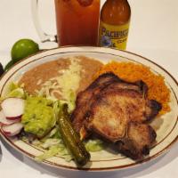Pork Chops Platillo · 2 - 6 oz. center cut pork chops grilled. Served with rice, beans, guacamole and tortillas.
