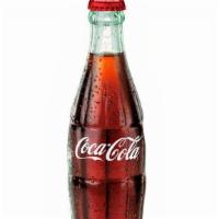 Coke • Mexican Bottle (16 Oz) · Mexican coke is sweetened using cane sugar as opposed to high-fructose corn syrup. Mexican c...