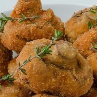 Fried Mushrooms · Fresh hand-breaded mushrooms, deep fried to a golden brown color. Served with a side of ranc...