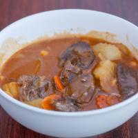 Massaman Curry · Massaman curry , potatoes, carrot, onion, peanut and coconut milk.