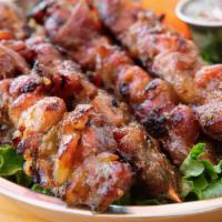 Moo Ping · The most famous street food in thailand, grilled marinated pork on skewers.