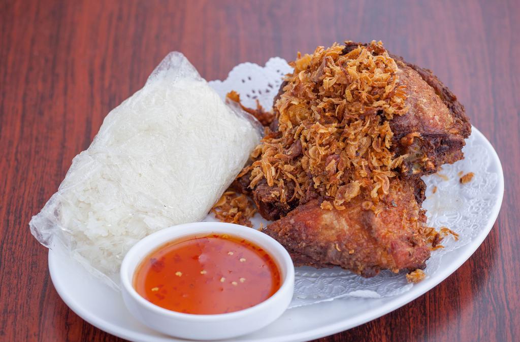 Hat Yai Fried Chicken · Southern thai style fried chicken served with sticky rice, fried shallot, and sweet chili sauce.