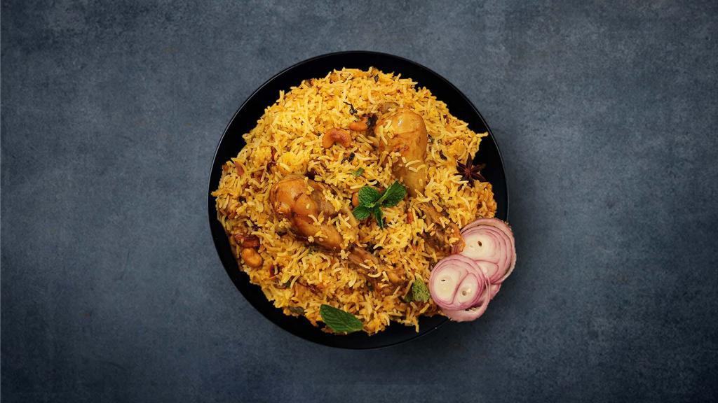 Marvelous Chicken Biryani · (24 Oz.) Aromatic rice cooked with chicken tenders, Indian spices, and herbs. Served with a side of raita.